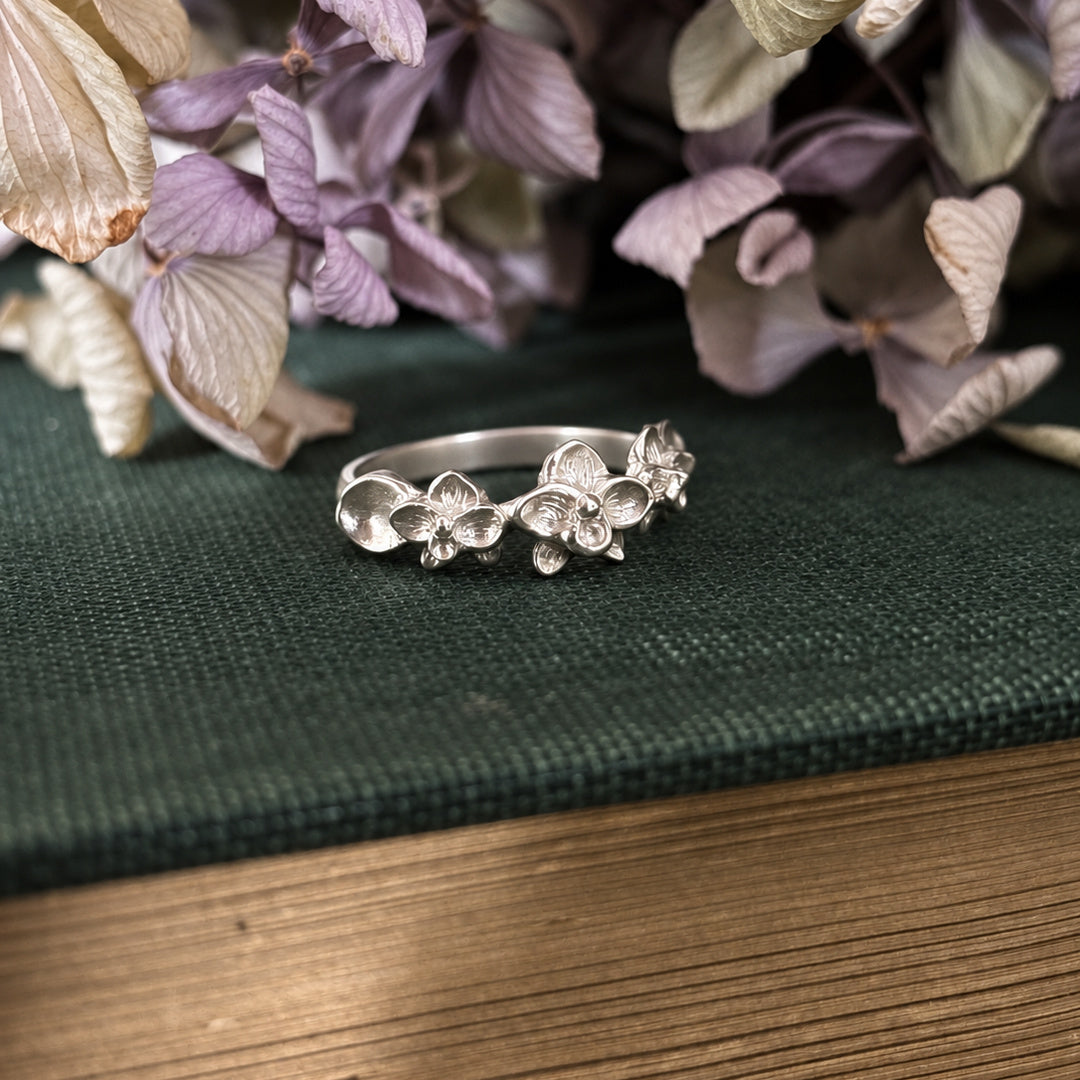 Anillo tres orquídeas