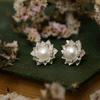Flor de loto con perlas